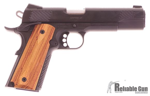 Picture of Used Kimber 1911 Raptor II Single Action Semi-Auto Pistol - 45 ACP, 5", Blued Slide And Frame, Zebra Wood Scale Pattern Kimber Logo Grips, Fixed Tactical Wedge Tritium Night Sights, Ambi Safety, 5 Magazines, Very Good Condition