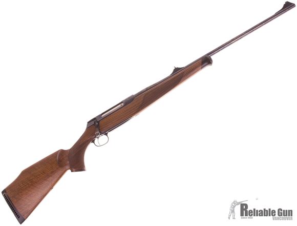 Picture of Used Sauer 202 Bolt Action Rifle, 7mm Rem Mag, 26" Barrel With Sights, 1 Mag, Walnut Stock, Small Rust Spots on Receiver Otherwise Very Good Condition