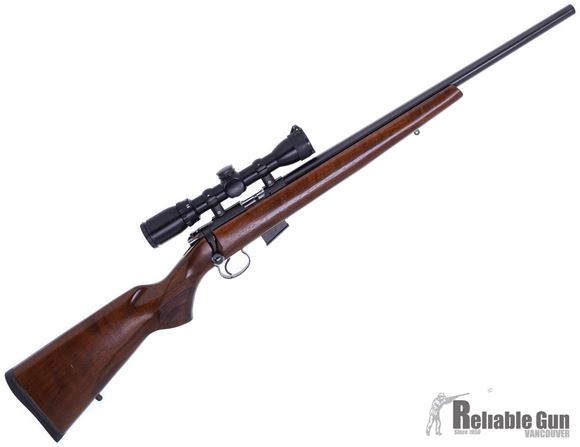 Picture of Used CZ 452-2E ZKM HB Varmint Bolt Action Rifle - 17 HMR, Blued, Heavy Barrel, Walnut Stock, 2x5rd Magazine, Swift 1.5-4.5x32 Scope, Free Floated Barrel, Very Good Condition