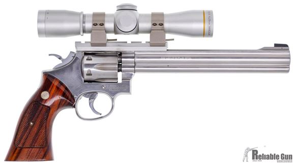 Picture of Used Smith & Wesson 617 Stainless, 22 LR, 8-3/8'' Barrel, Original Wood Grips, Silver Leupold FX-II 4x28 Scope, Case, Good Condition