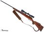 Picture of Used Weatherby Mark V Deluxe Bolt-Action 300 Wby Mag, 26" Barrel, With Bushnell Elite 4200 2.5-10x40mm Scope, Walnut Stock W/Crack By the Bolt Handle, Leather Sling, Fair Condition