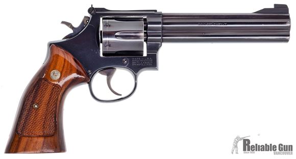 Picture of Used Smith & Wesson Model 586 DA Revolver, 357 Mag, 6" Blued, Wood Grips, Leather Galco Holster, 6 Shot, Good Condition