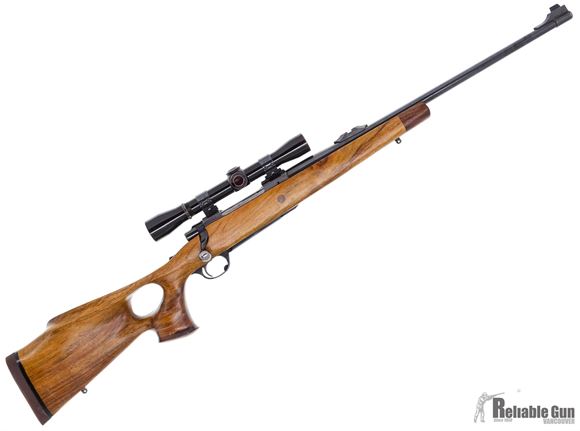 Picture of Used Ruger M77 Bolt Action Rifle, 30-06 Sprg, 22'' Barrel, Custom Thumbhole Wood Stock, Leupold M7 4x Scope, Good Condition