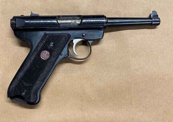 Picture of Used Ruger Mark III Semi Auto, 22 LR, 4.5" Tapered  Barrel, Minor Pitting On Barrel, 2 Magazines, Fair Condition