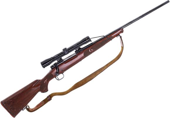 Picture of Used Winchester Model 70 Featherweight Push Feed Bolt Action Rifle, 270 Win, 22" Barrel, Leupold M8 Fixed 4X Scope, Heavily Scratched Stock And Number Engraved in Trigger Guard Otherwise Good Condition