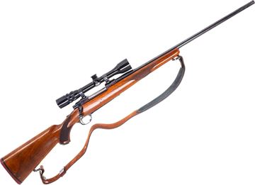 Picture of Used Ruger M77 Bolt-Action Rifle, 338 Win Mag, 24" Barrel, Blued, Wood Stock, Plumb Receiver, Bushnell 3-9x38 Riflescope, Leather Sling, Soft Case, Fair Condition