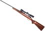 Picture of Used Ruger M77 Bolt-Action Rifle, 7mm Rem Mag, 24" Barrel, Gloss Blued, Wood Stock, Plumb Blued Receiver, Tang Saftey, Bushnell 3-9x40 Riflecope, Good Condition