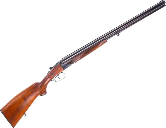 Picture of Used Merkel Suhl Model 32 Drilling, 12ga - 7x65R, 25.6'' Barrels w/Flip up Rifle Sight, Case Hardened Reciever w/Scroll Engraving, Walnut Stock, Double Trigger, Original Box With Test Target And Build Sheet, New In Box, Has Some Factory Grease On Barrel,