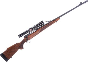 Picture of Used Model 70 Bolt-Action Rifle, 338 Win Mag, 24" Barrel, Parkerized, Wood Stock, Leupold Vari-X II 3-9x40 Riflescope, Muzzle Brake, 1971 Mfg, Push Feed, Rigs Rusted, Fair Condition